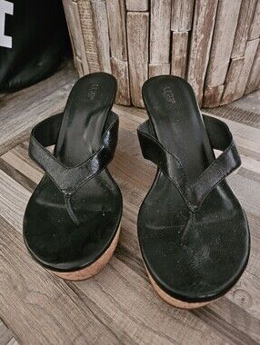 UGG Lucianna black leather and cork wedge thong sandals. 7.5
